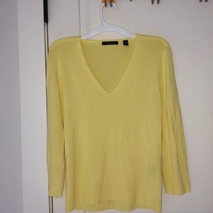 Yellow Cyrus shirt.